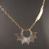 Starburst, darling: silver and hand hammered rose gold necklace