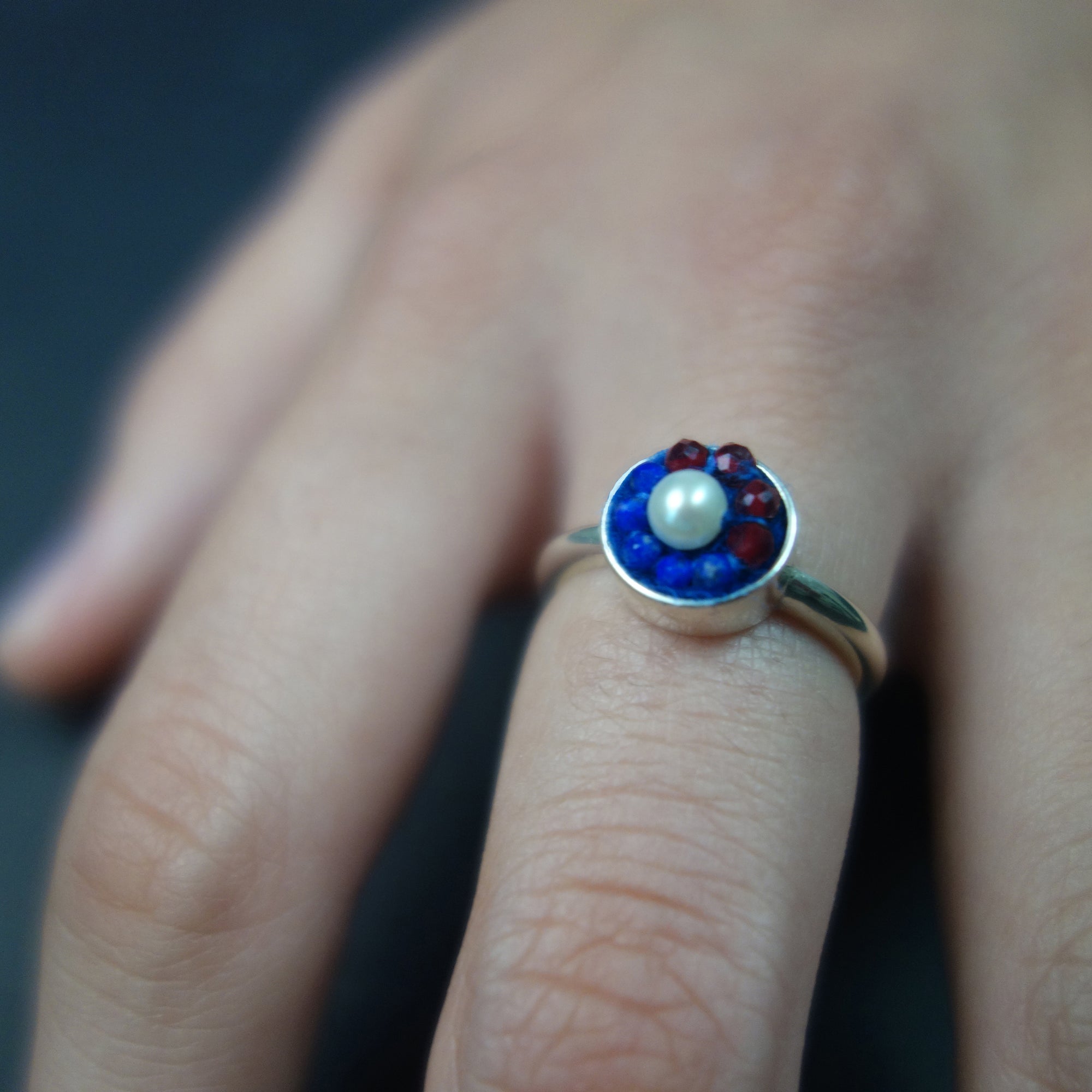 With this Ring: pearl, garnet, and lapis mosaic