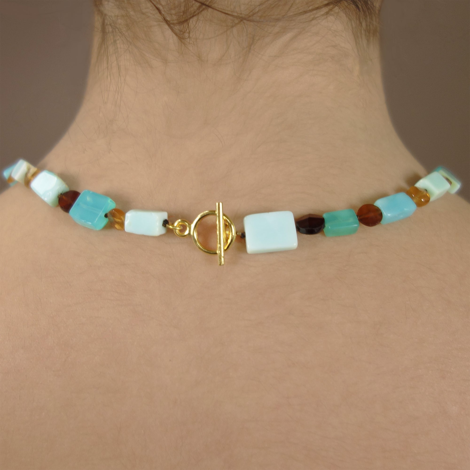 Swiss blue topaz, tiger eye, and opal mosaic necklace