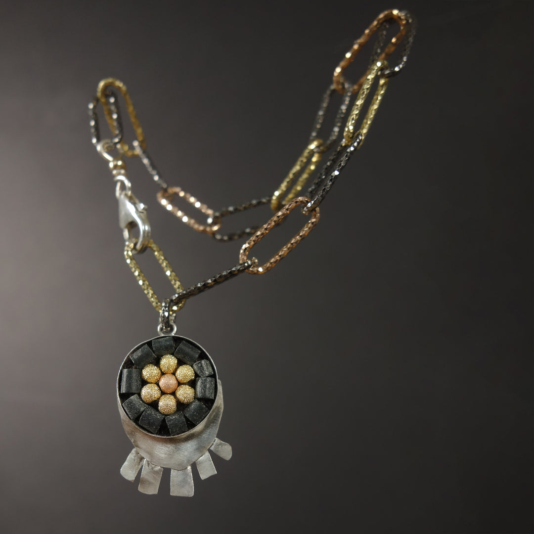 Sunrise, Sunset: silver, onyx, and gold bracelet