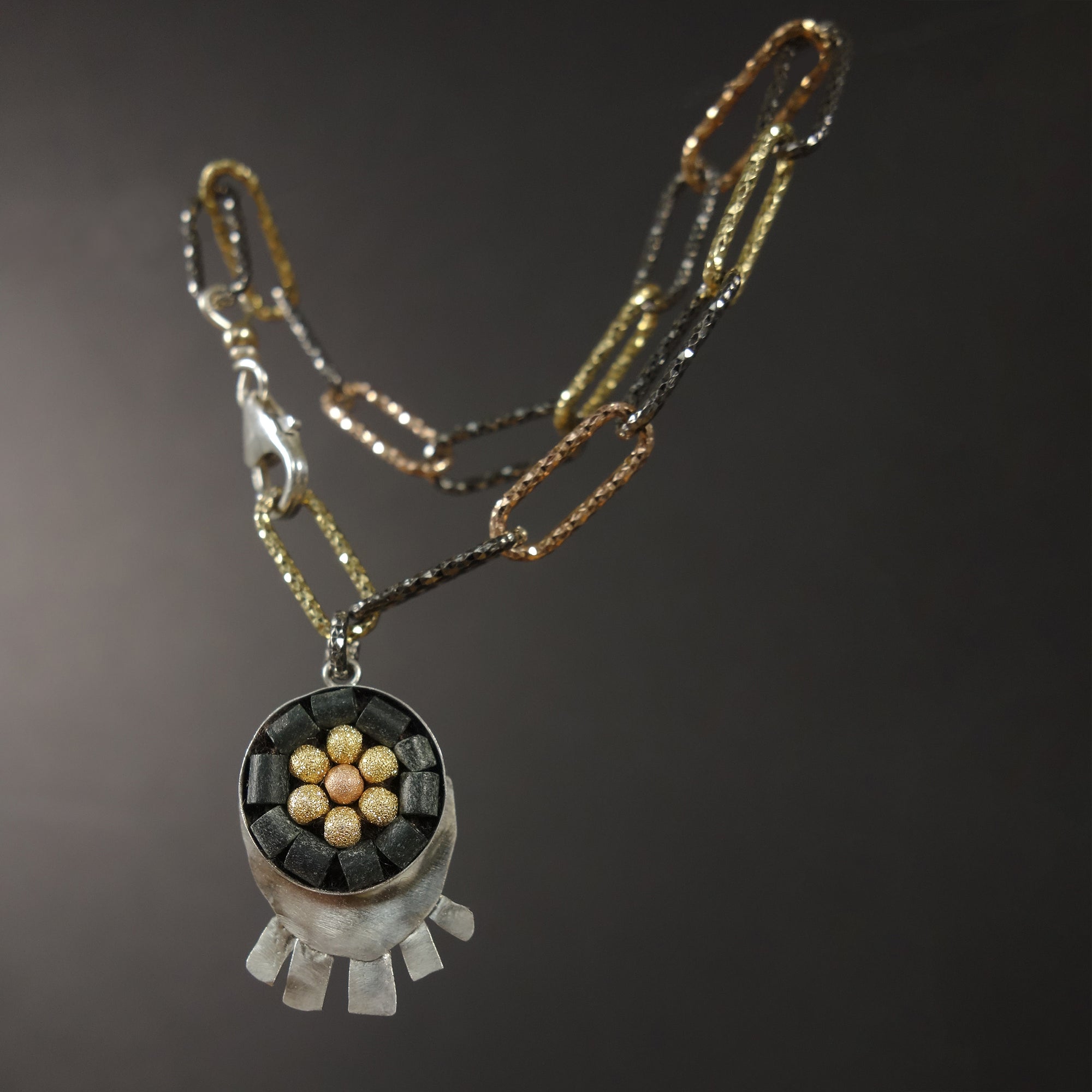 Sunrise, Sunset: silver, onyx, and gold bracelet