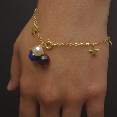 The Stars at Night: lapis, garnet, and pearl gold stars bracelet