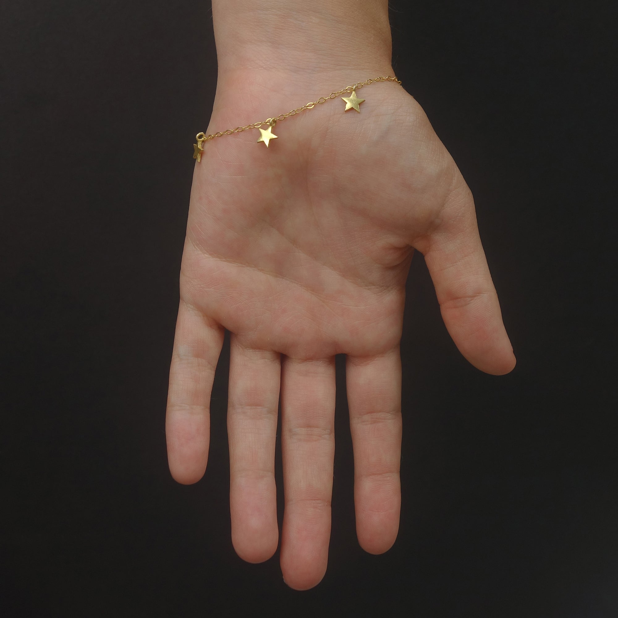 The Stars at Night: lapis, garnet, and pearl gold stars bracelet