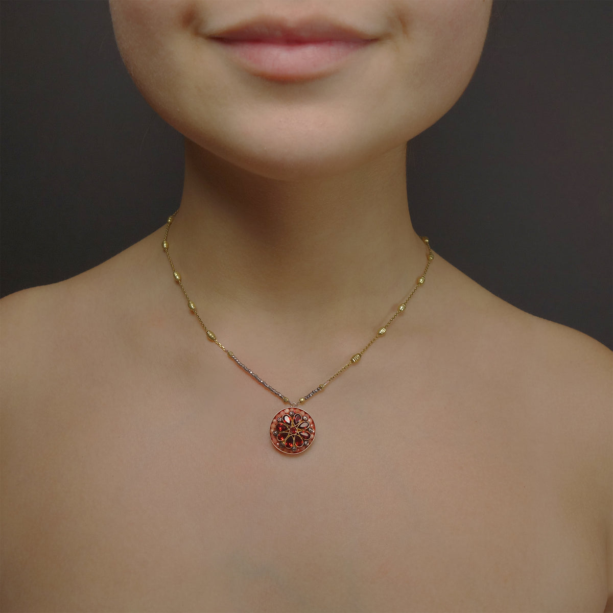 Byzantine Sun necklace: garnet, diamond, and pink sapphire mosaic