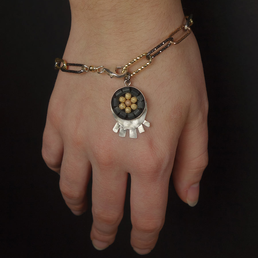 Sunrise, Sunset: silver, onyx, and gold bracelet