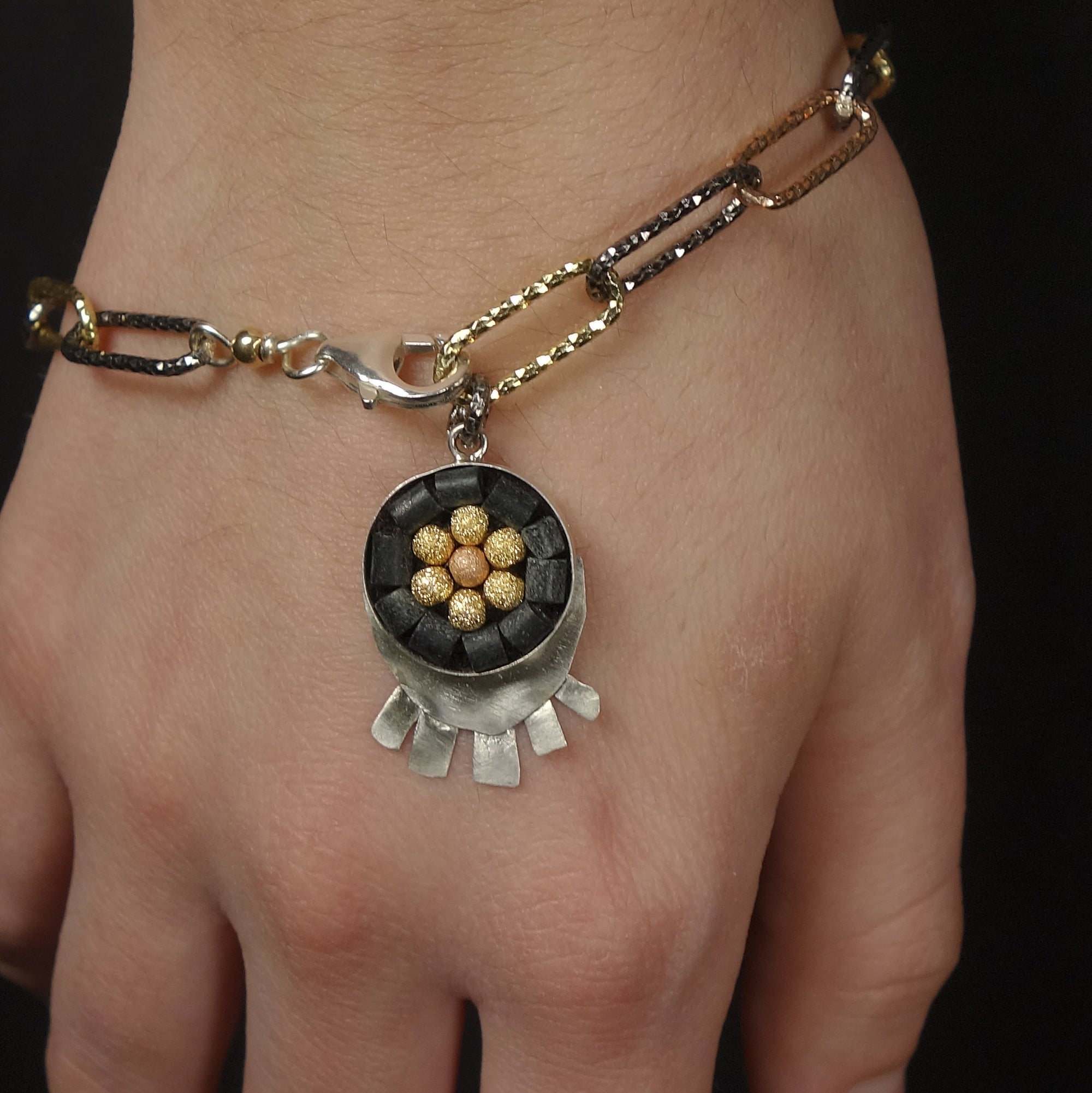 Sunrise, Sunset: silver, onyx, and gold bracelet