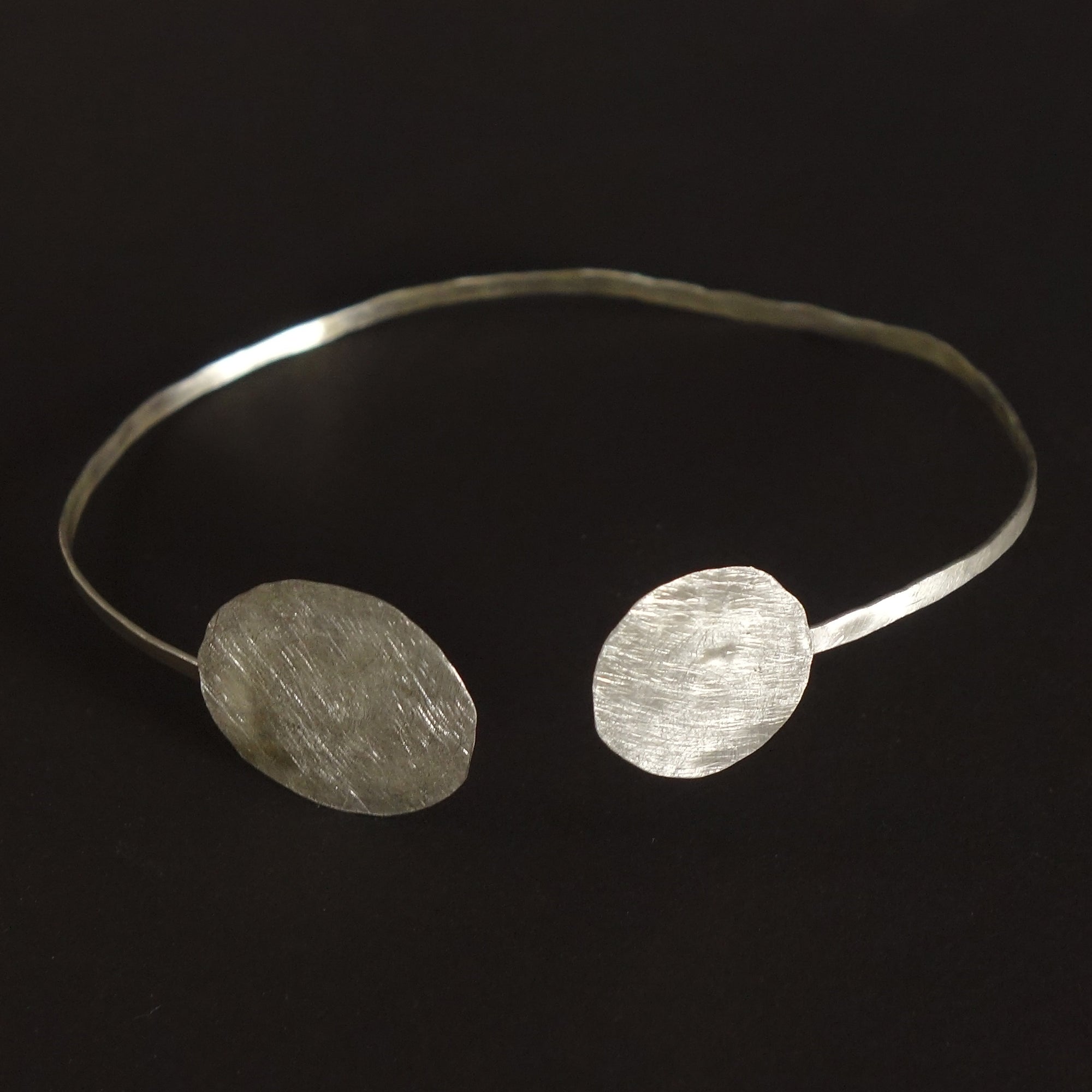 When the Planets Aligned: hand hammered silver bangle