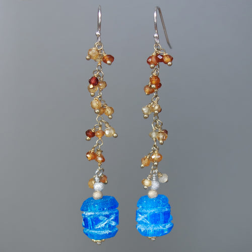 Carved apetite and hessonite garnet earring