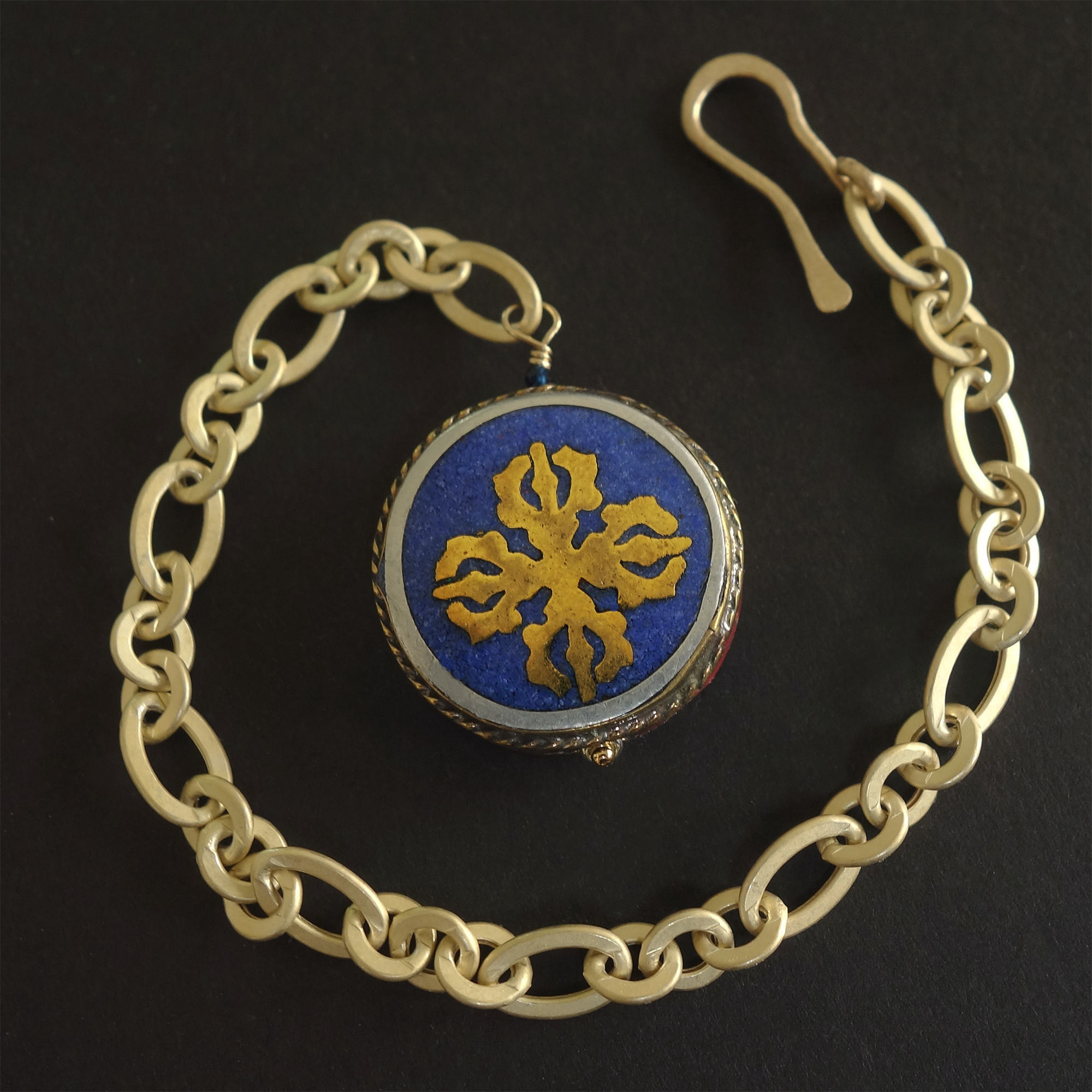 Matte gold chain and lapis bracelet