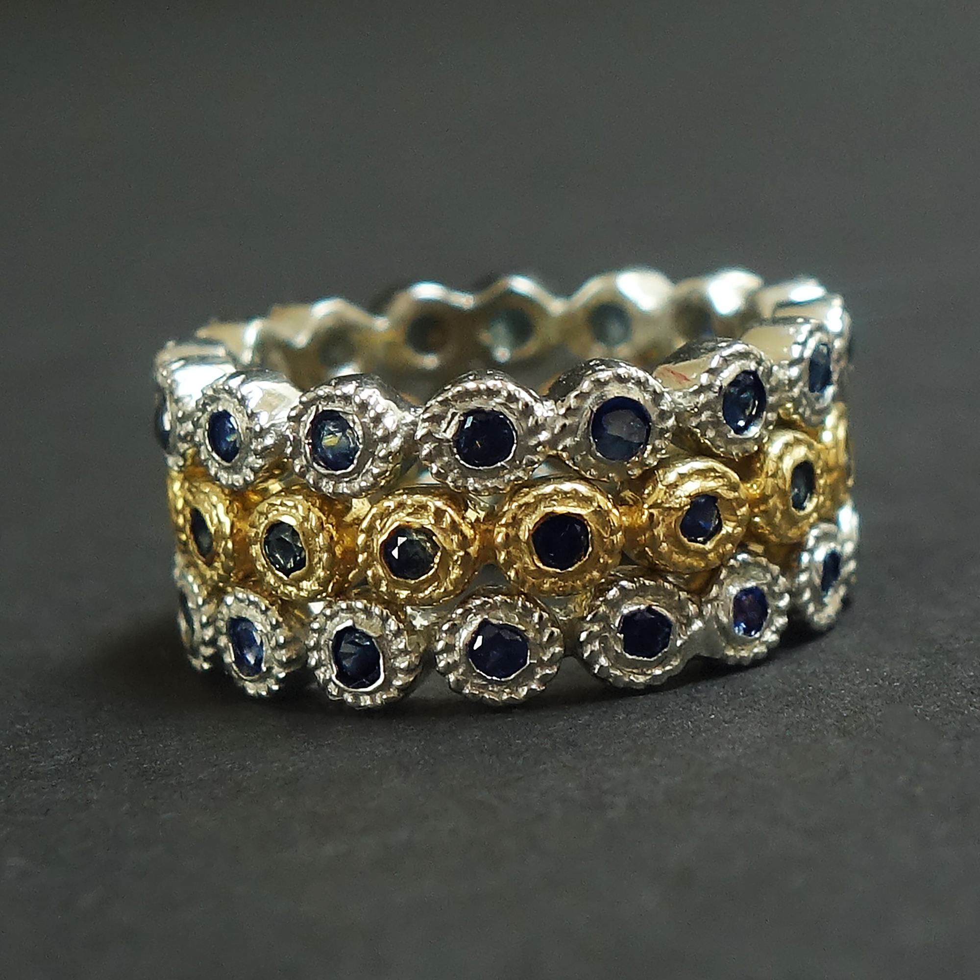 Stacking sapphire rings in silver + gold