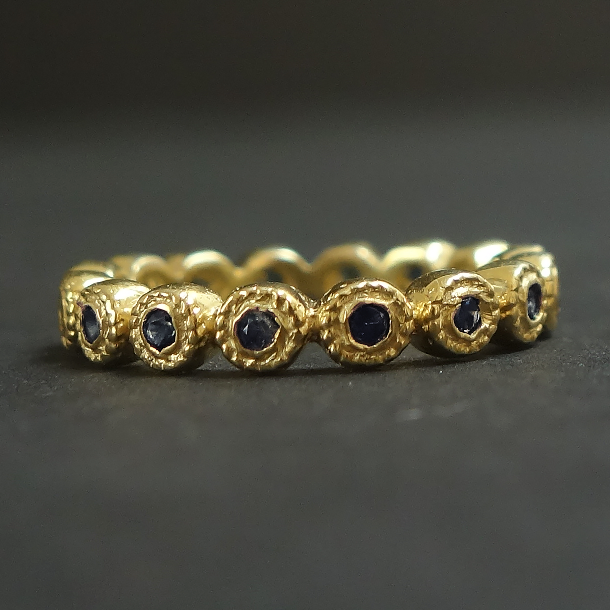 Stacking sapphire rings in silver + gold