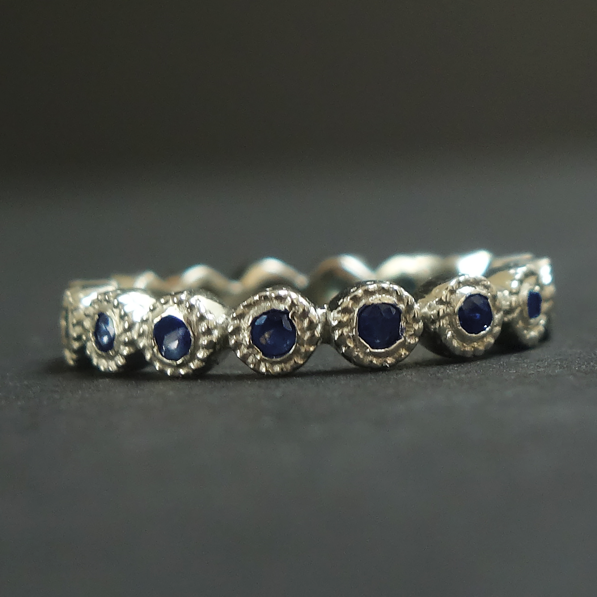 Stacking sapphire rings in silver + gold