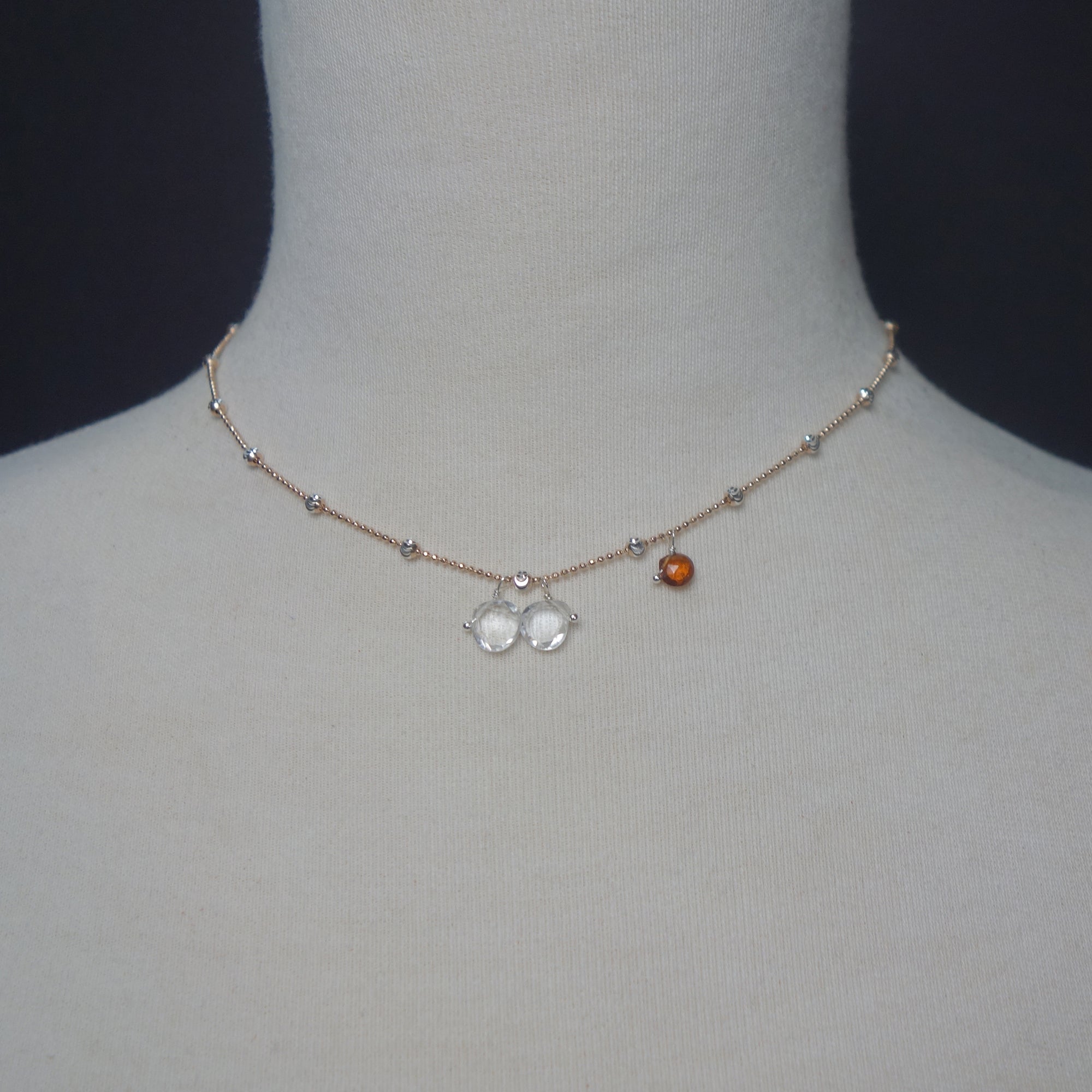 Clear Quartz, Rose Gold, and Hessonite Garnet