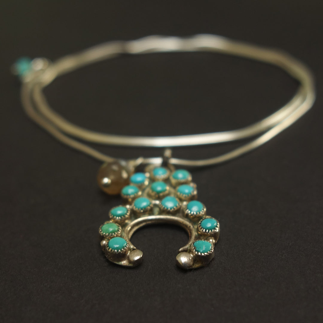 Navajo Naja with opal necklace