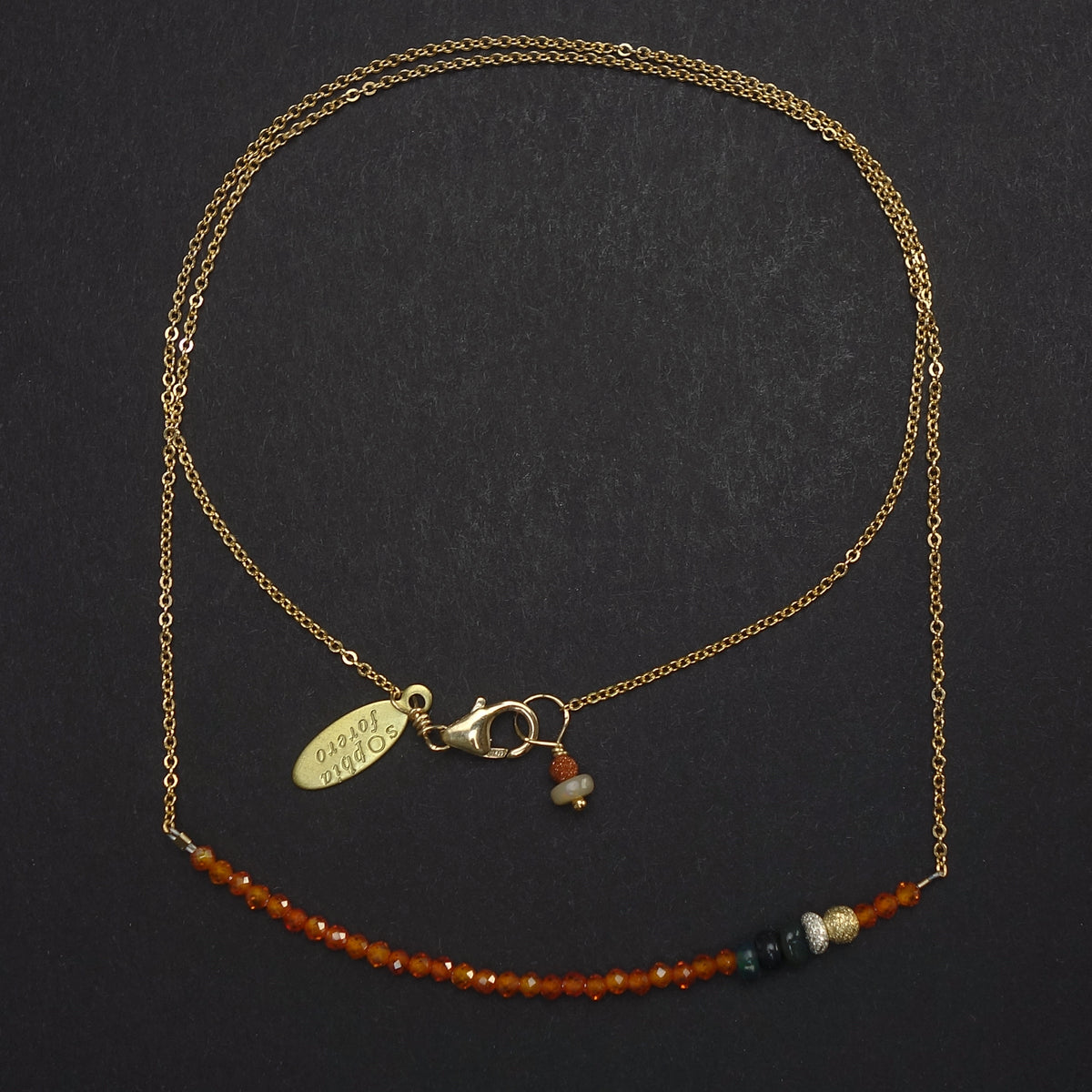 Faceted carnelian and black opal bar necklace