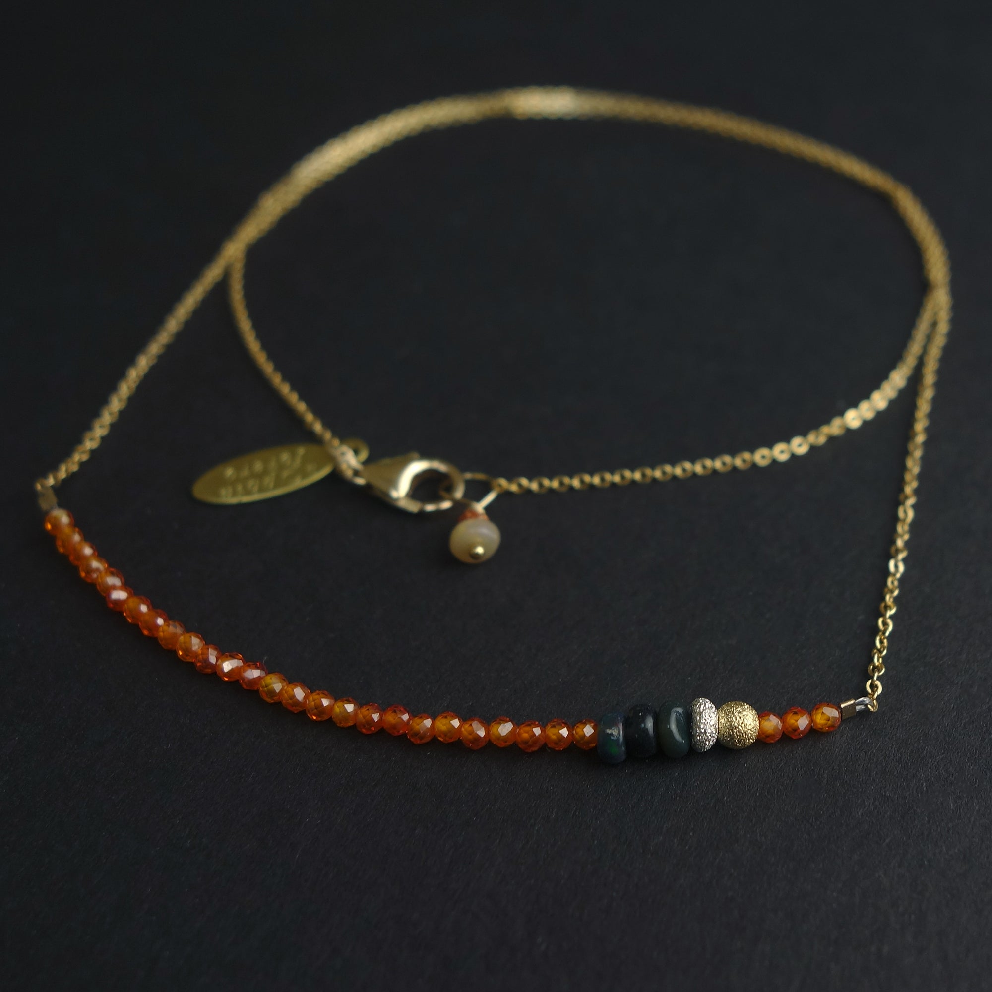Faceted carnelian and black opal bar necklace