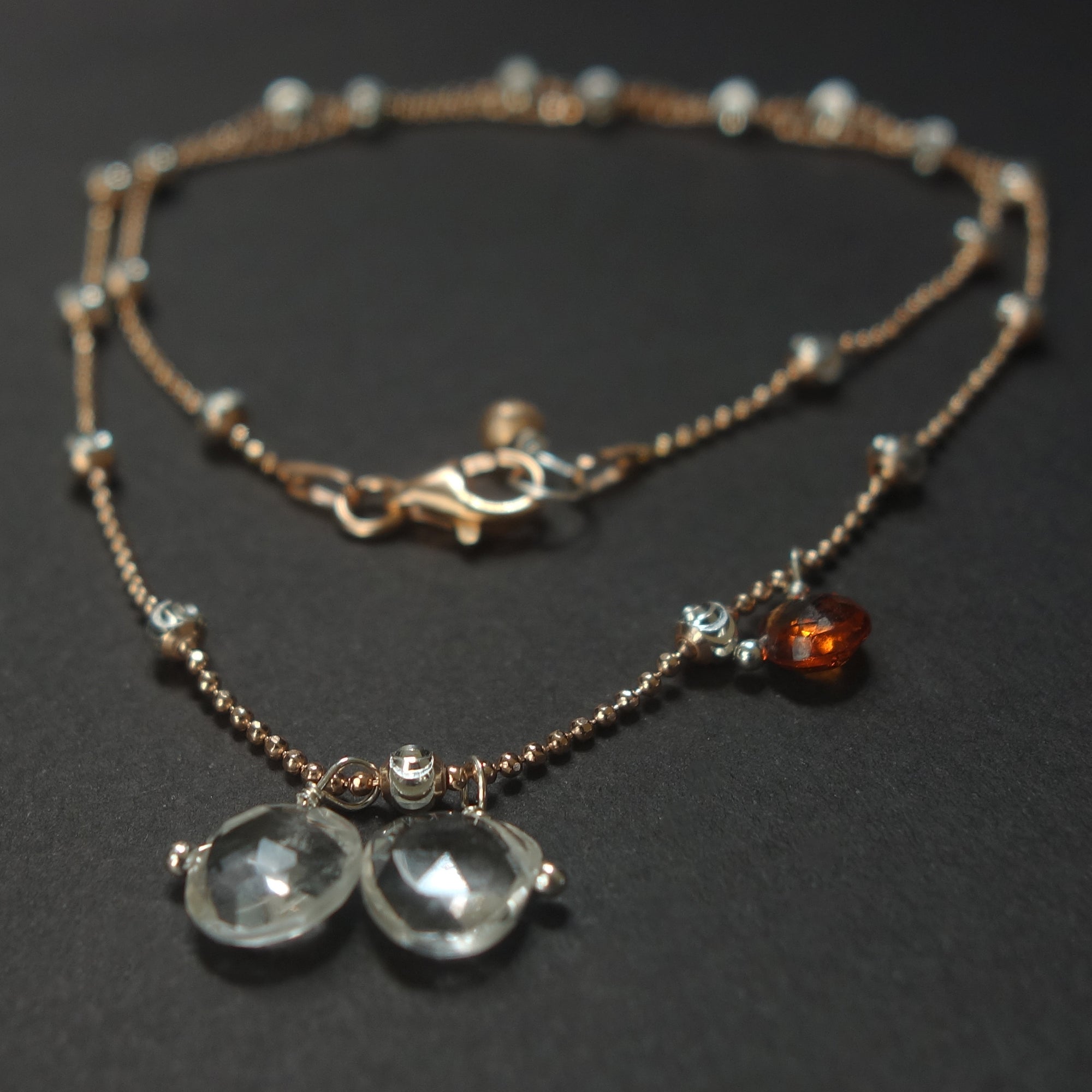 Clear Quartz, Rose Gold, and Hessonite Garnet