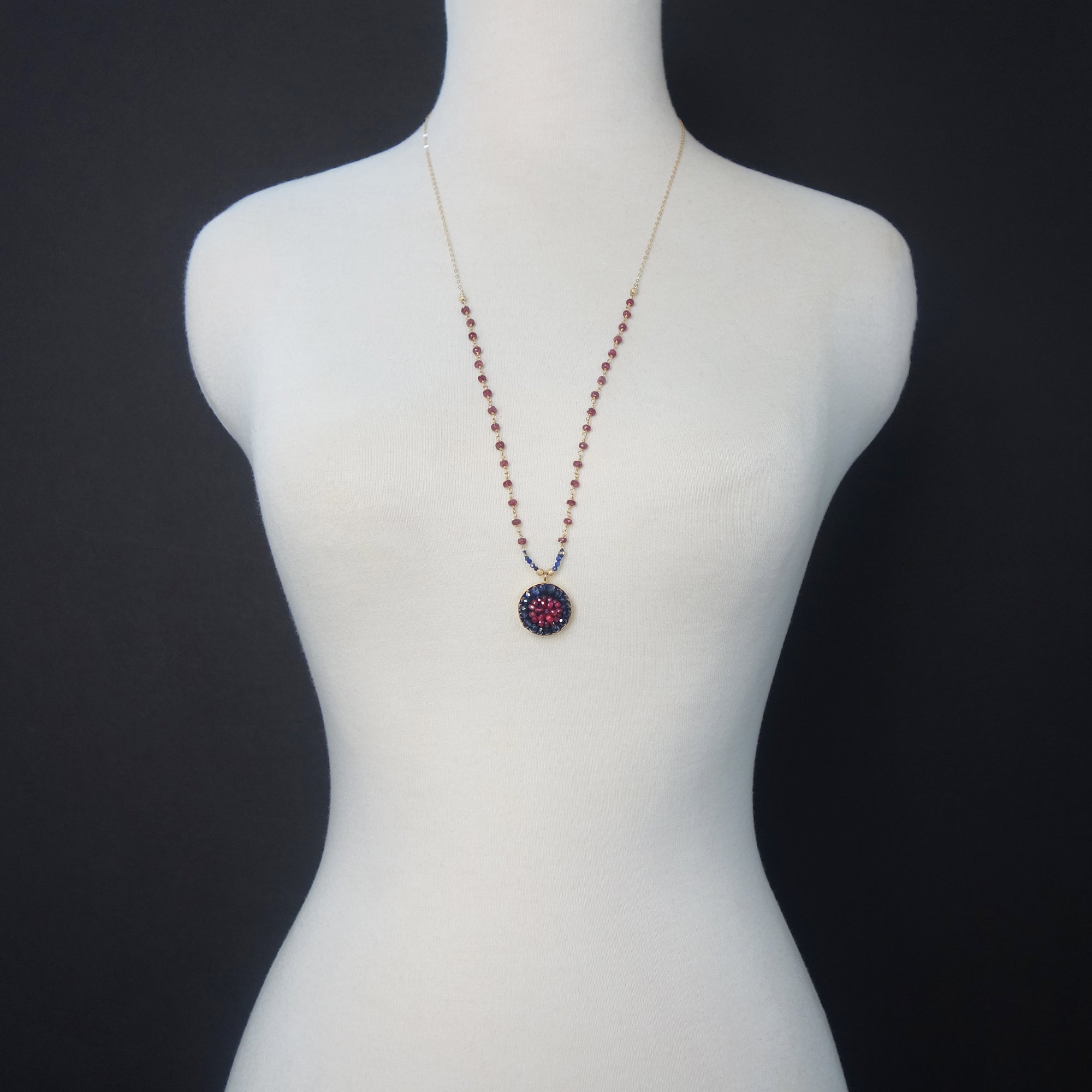 Axios: ruby, iolite, gold mosaic necklace