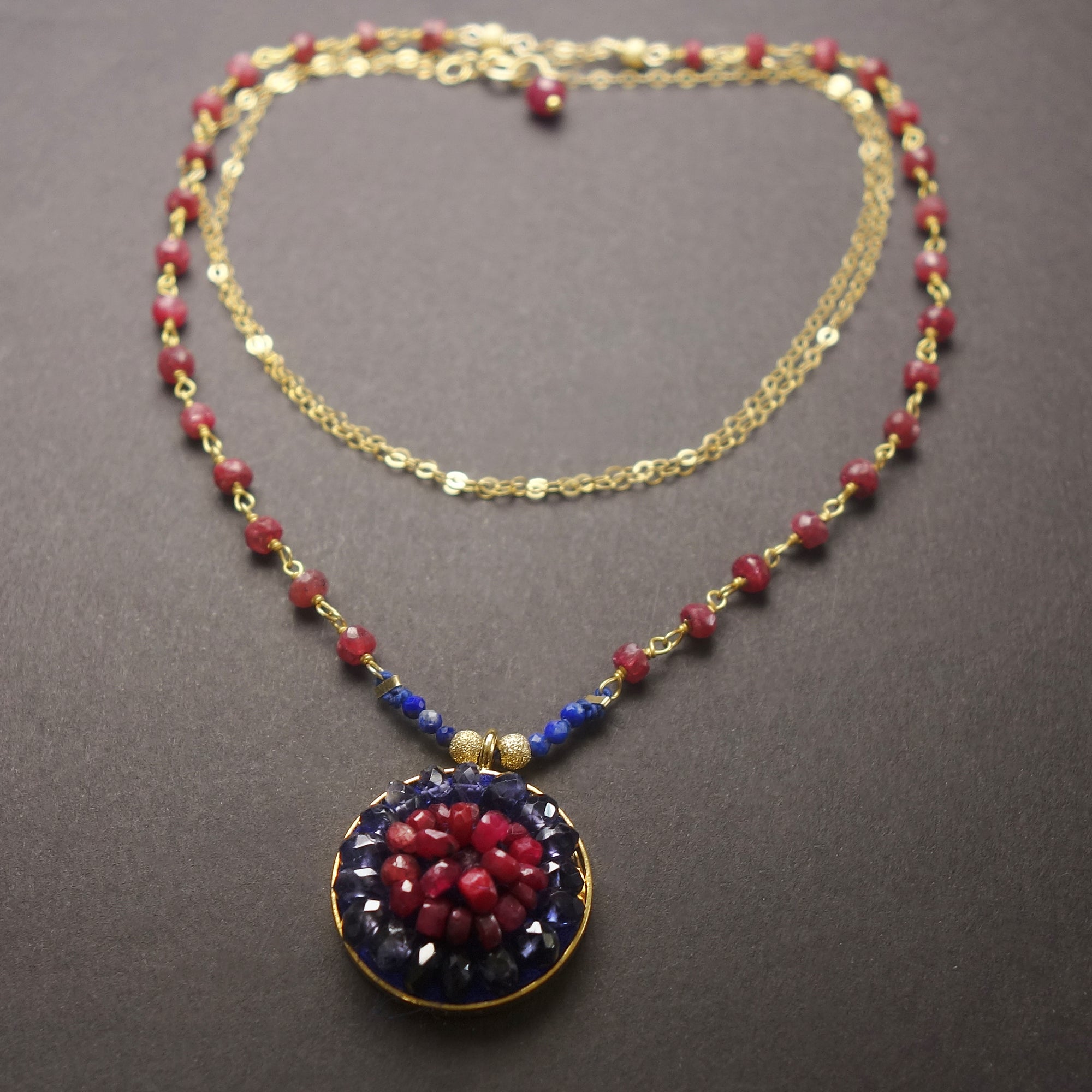Axios: ruby, iolite, gold mosaic necklace