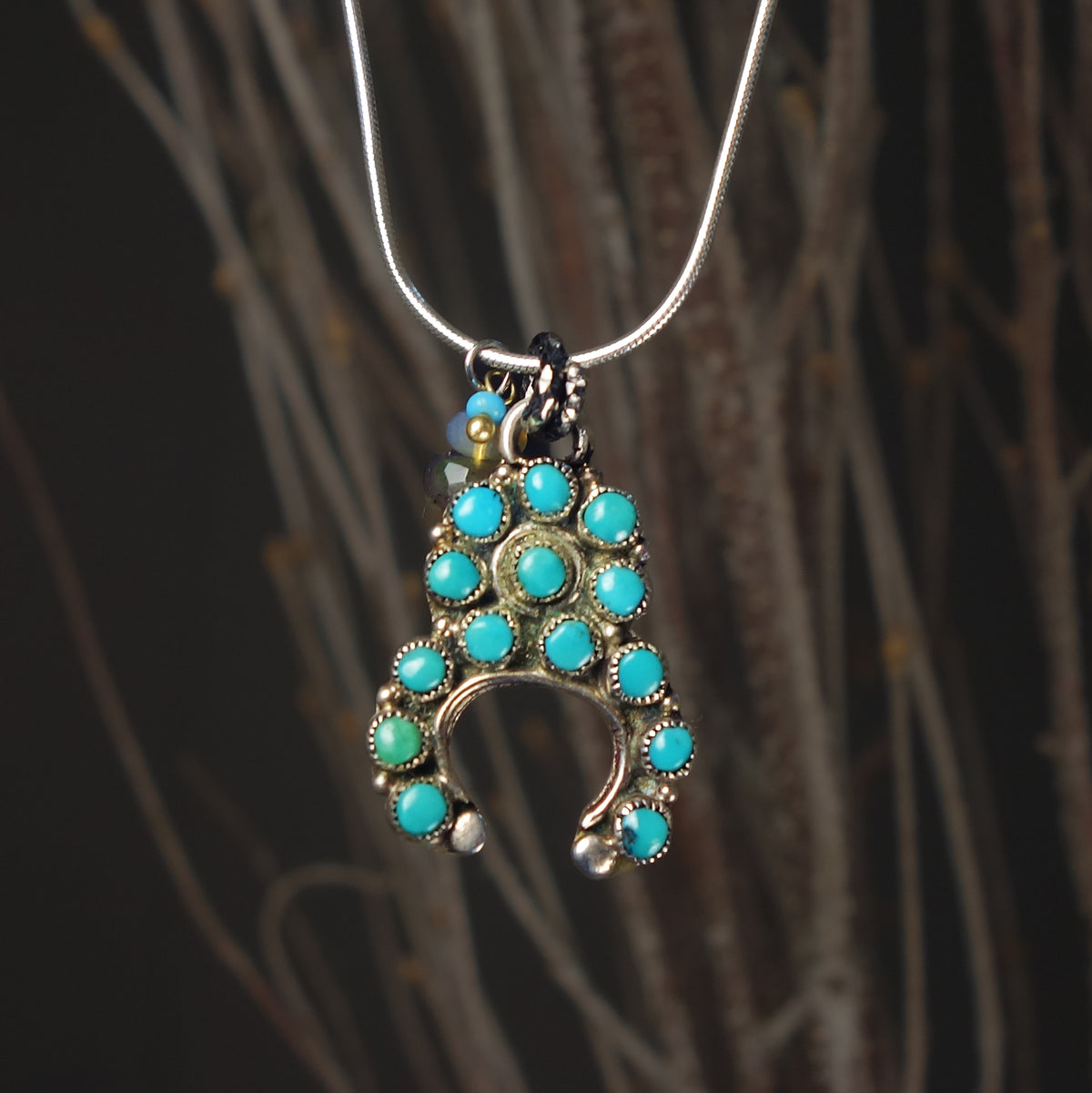 Navajo Naja with opal necklace