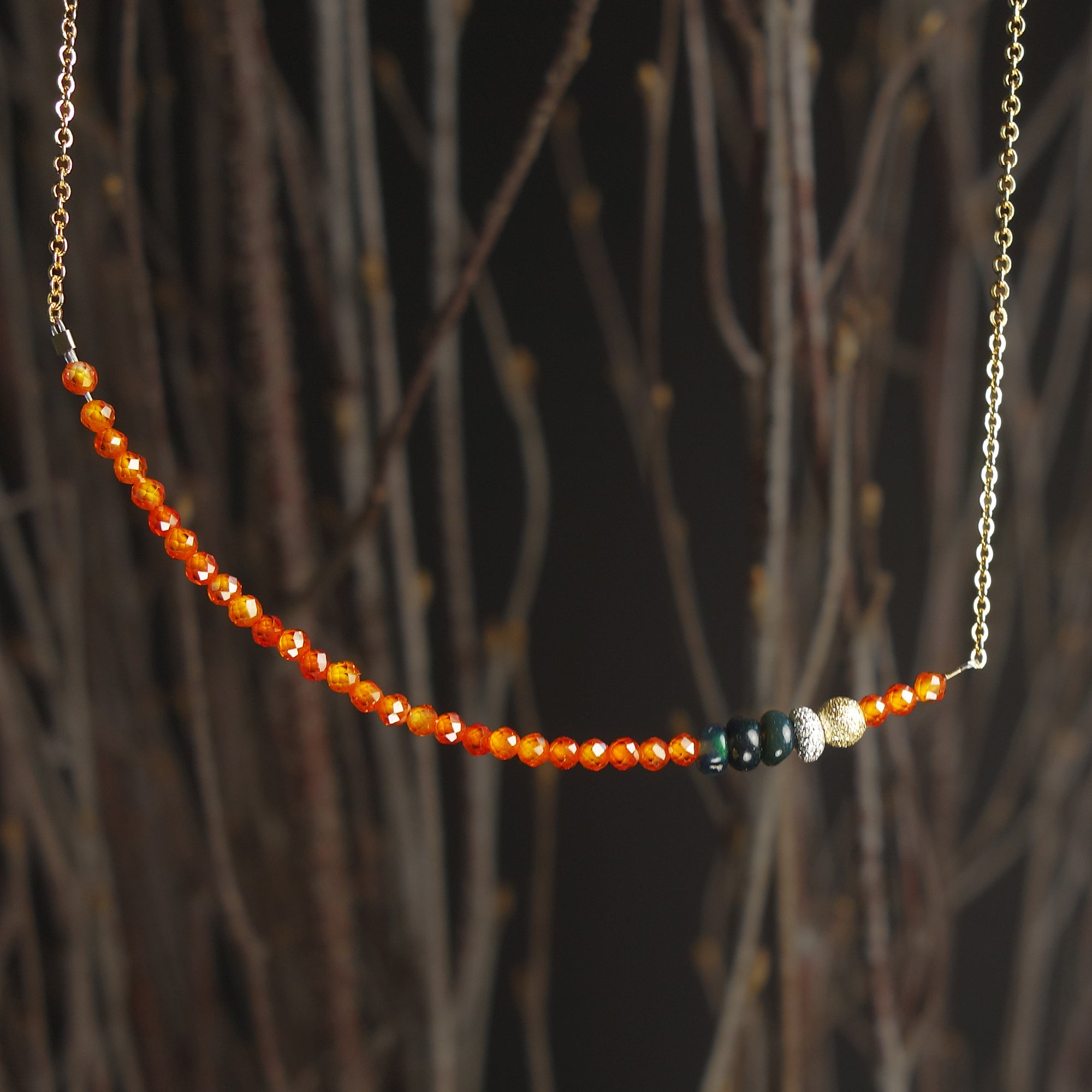 Faceted carnelian and black opal bar necklace
