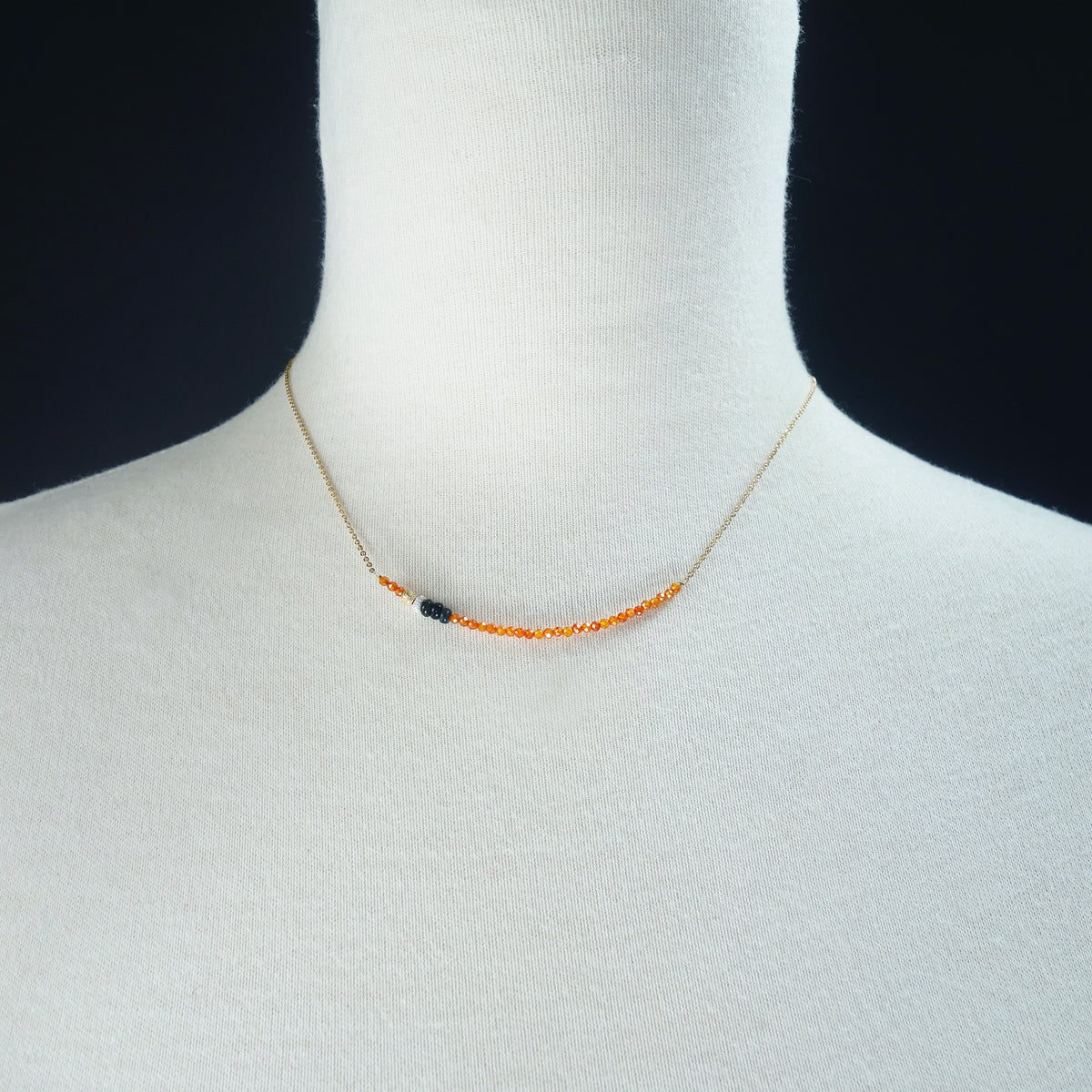 Faceted carnelian and black opal bar necklace