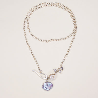 She Guarded the Calm Before the Storm: pearl mosaic necklace