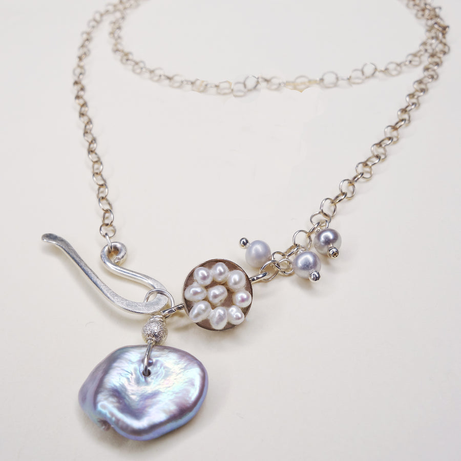 She Guarded the Calm Before the Storm: pearl mosaic necklace