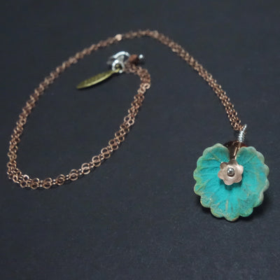 You'll Lose the Blues necklace: rose gold with lily leaf
