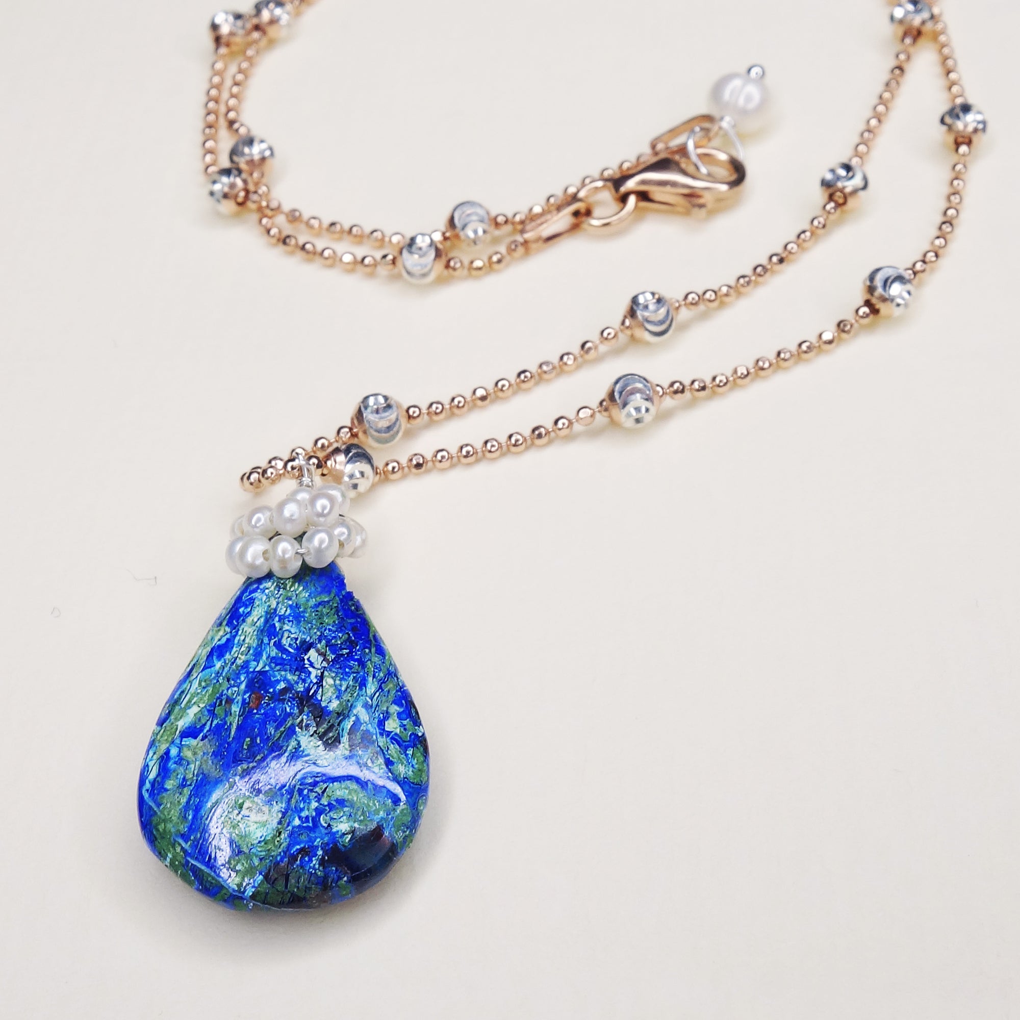 She Makes a Splash: azurite malachite, pearl, rose gold