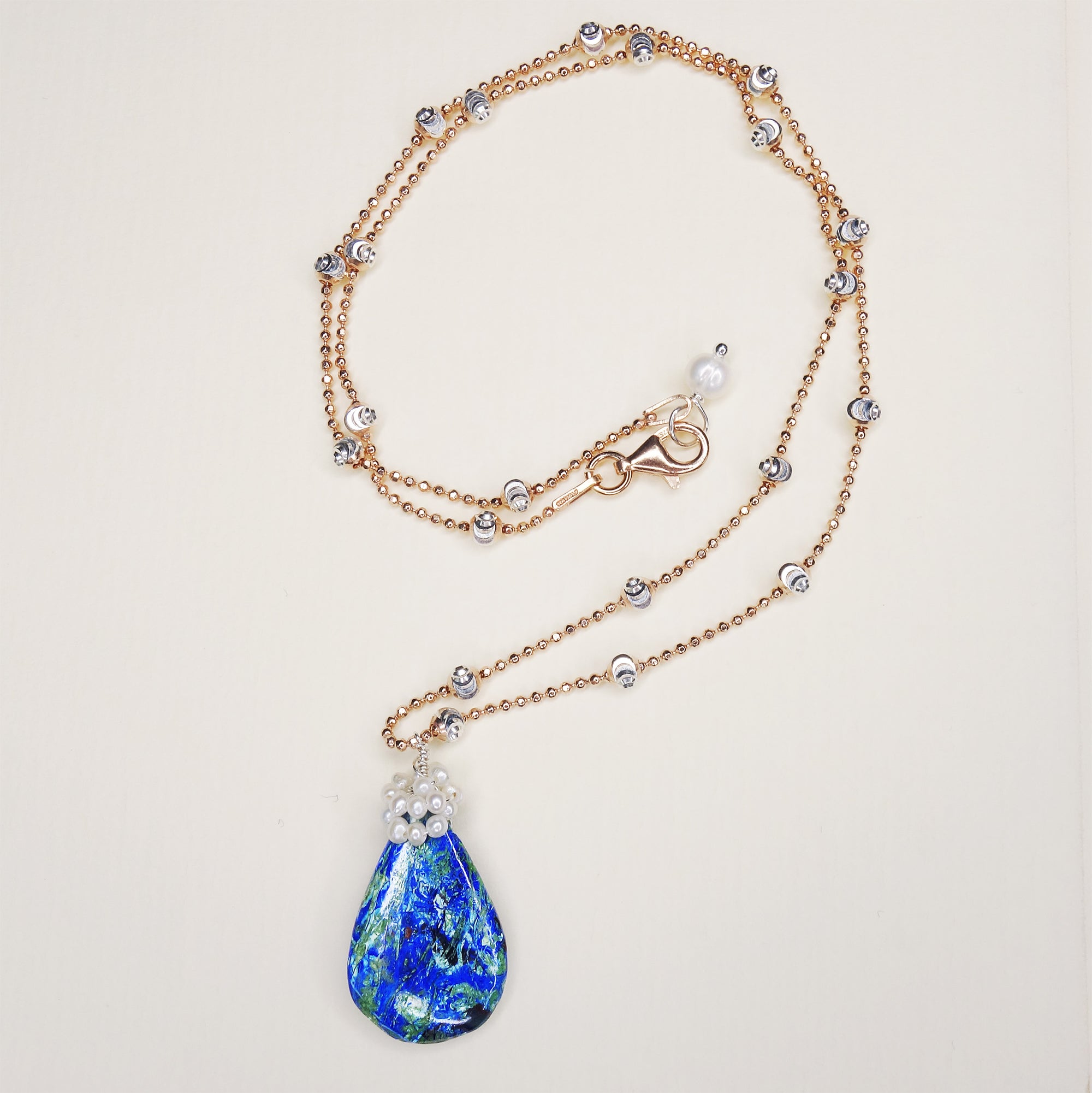 She Makes a Splash: azurite malachite, pearl, rose gold