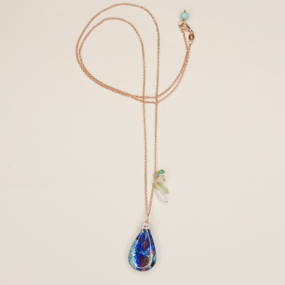 She Realized They Were Oceans Apart: lapis, opal, pearl necklace