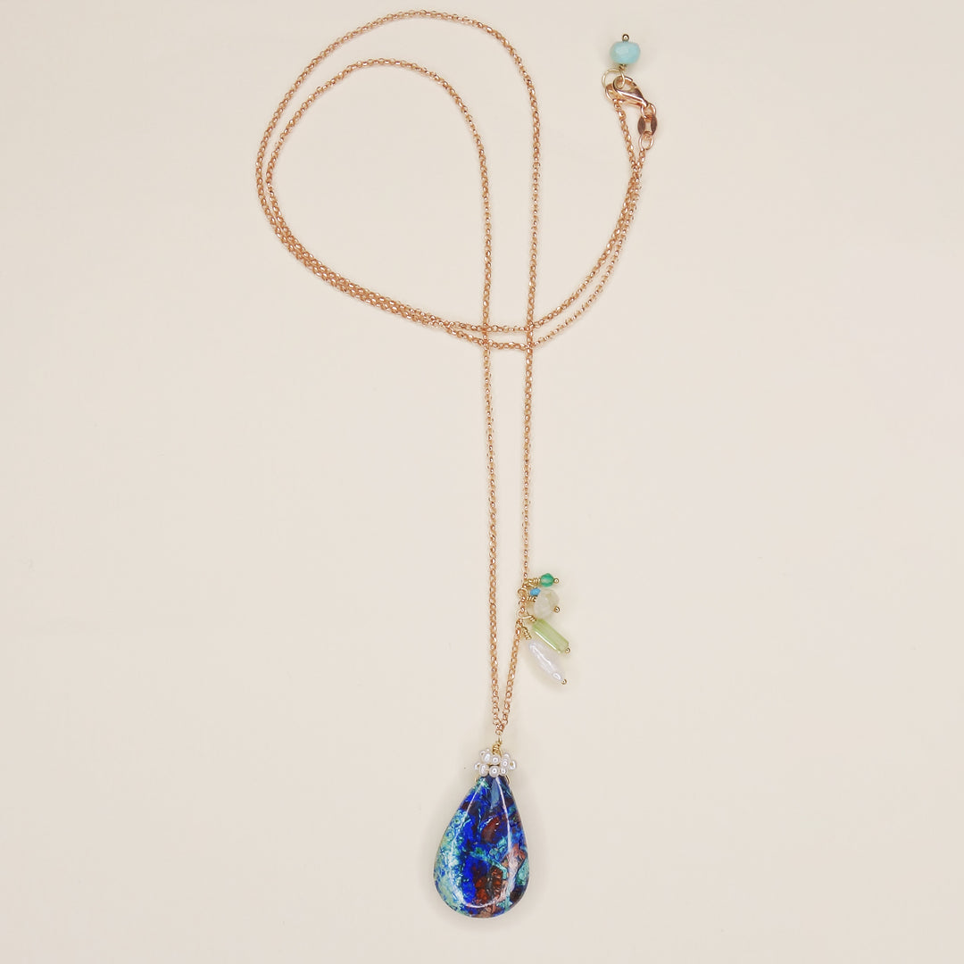 She Realized They Were Oceans Apart: lapis, opal, pearl necklace