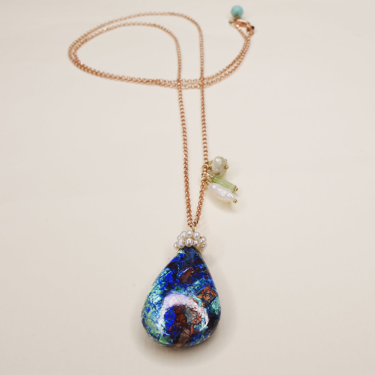 She Realized They Were Oceans Apart: lapis, opal, pearl necklace