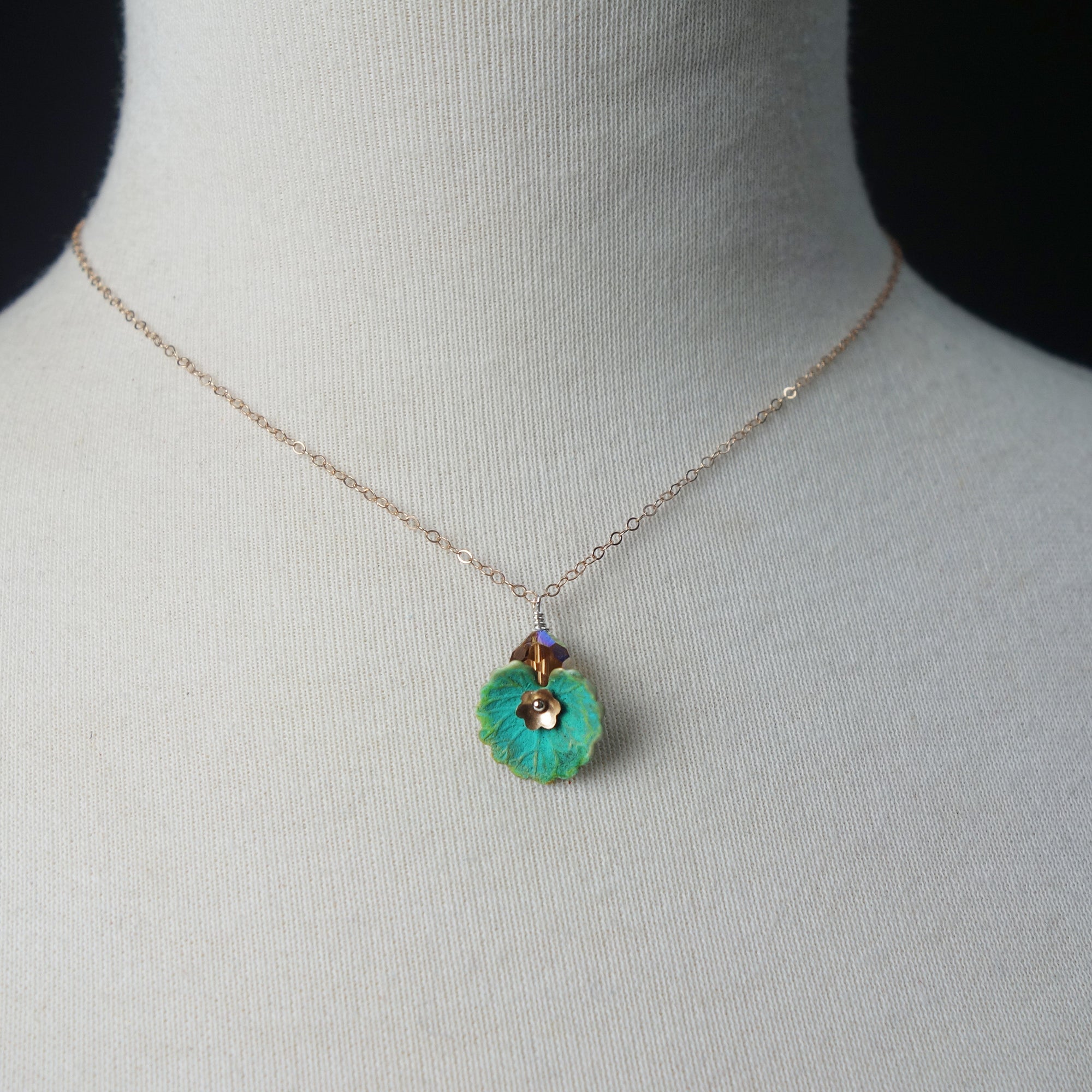 You'll Lose the Blues necklace: rose gold with lily leaf