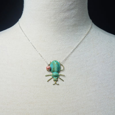 Yes, Cleopatra: patina scarab with rhodocrosite necklace