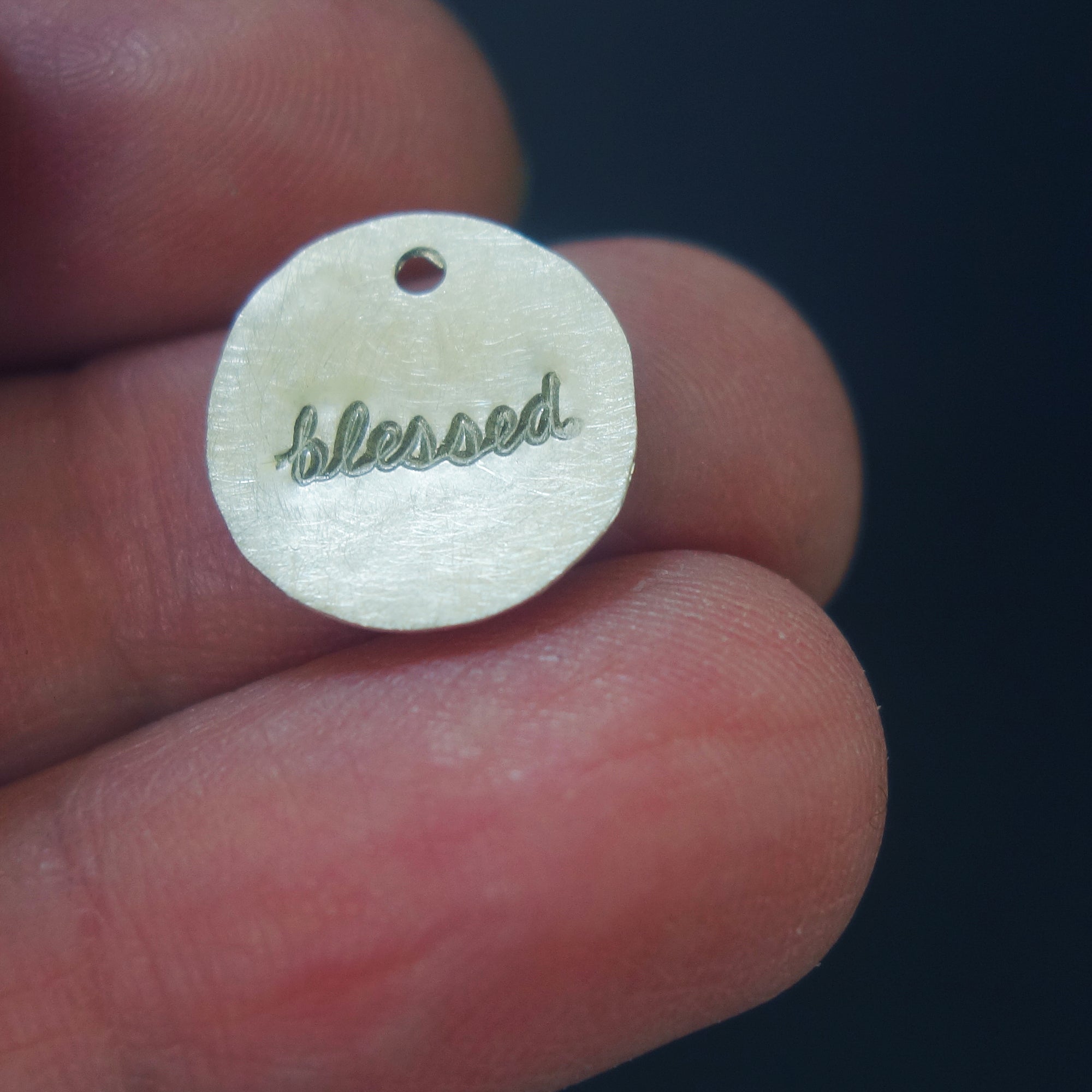 Blessed hand hammered charm