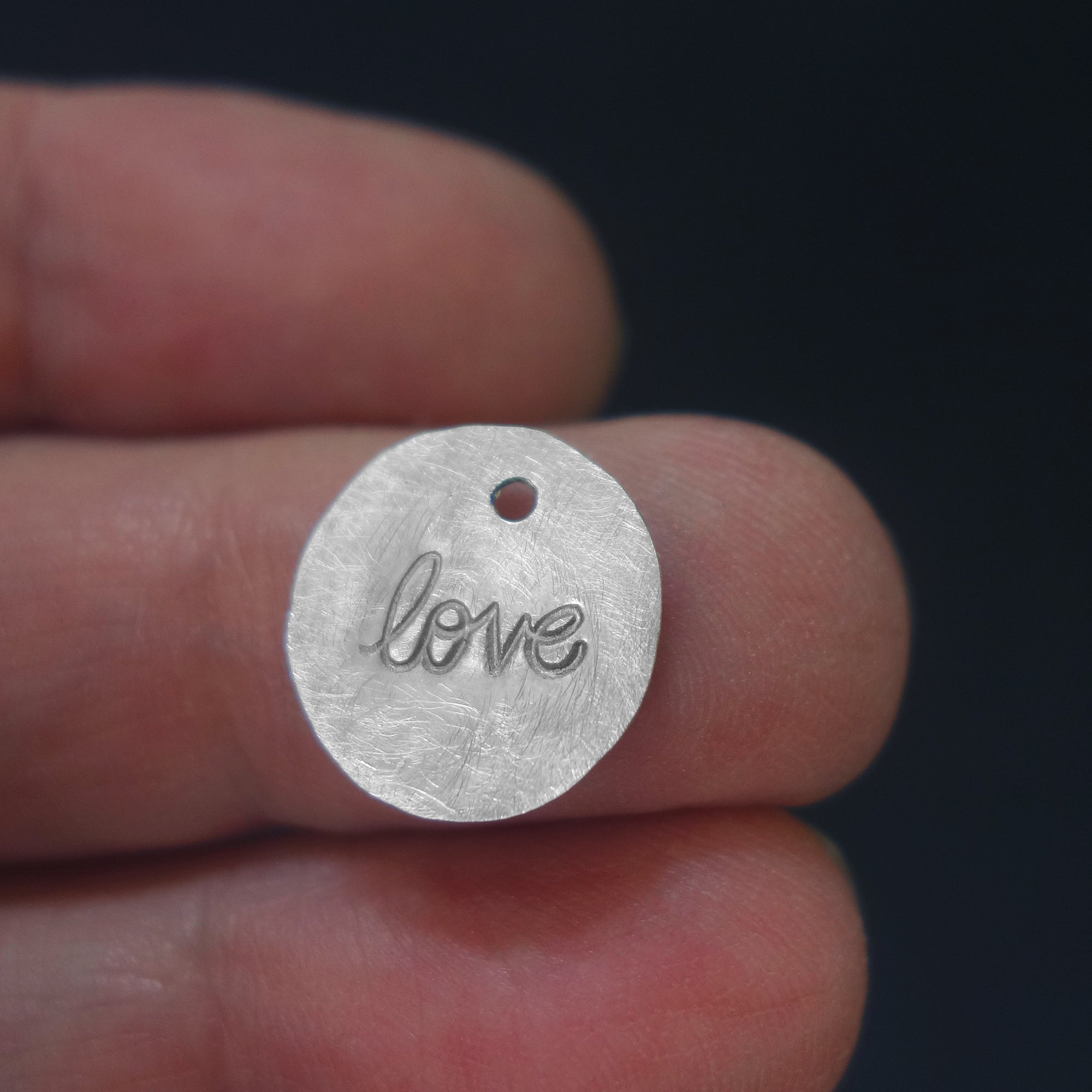 Love hand hammered charm