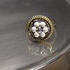 Good Trouble ring: labradorite, silver, and topaz in gold mosaic