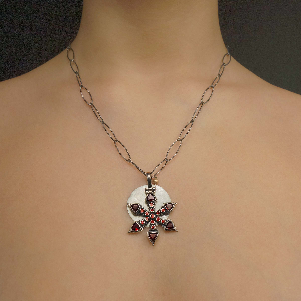Winter Wonderland: garnet and hand hammered silver necklace