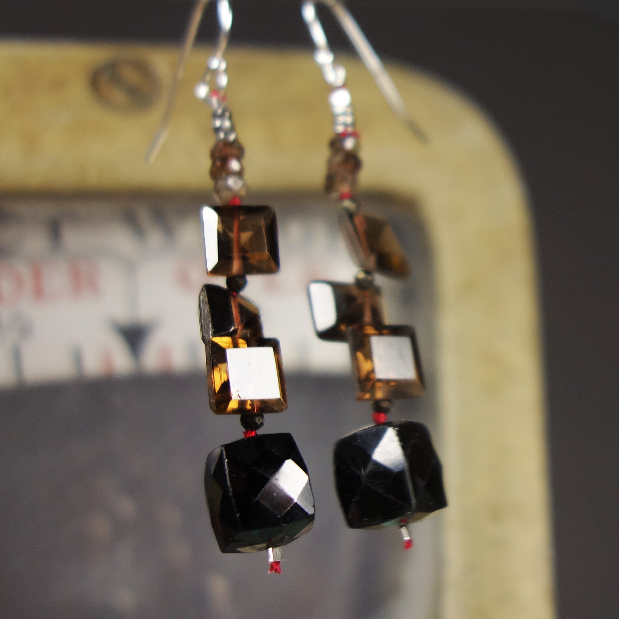 It's All Right: topaz and onyx earring