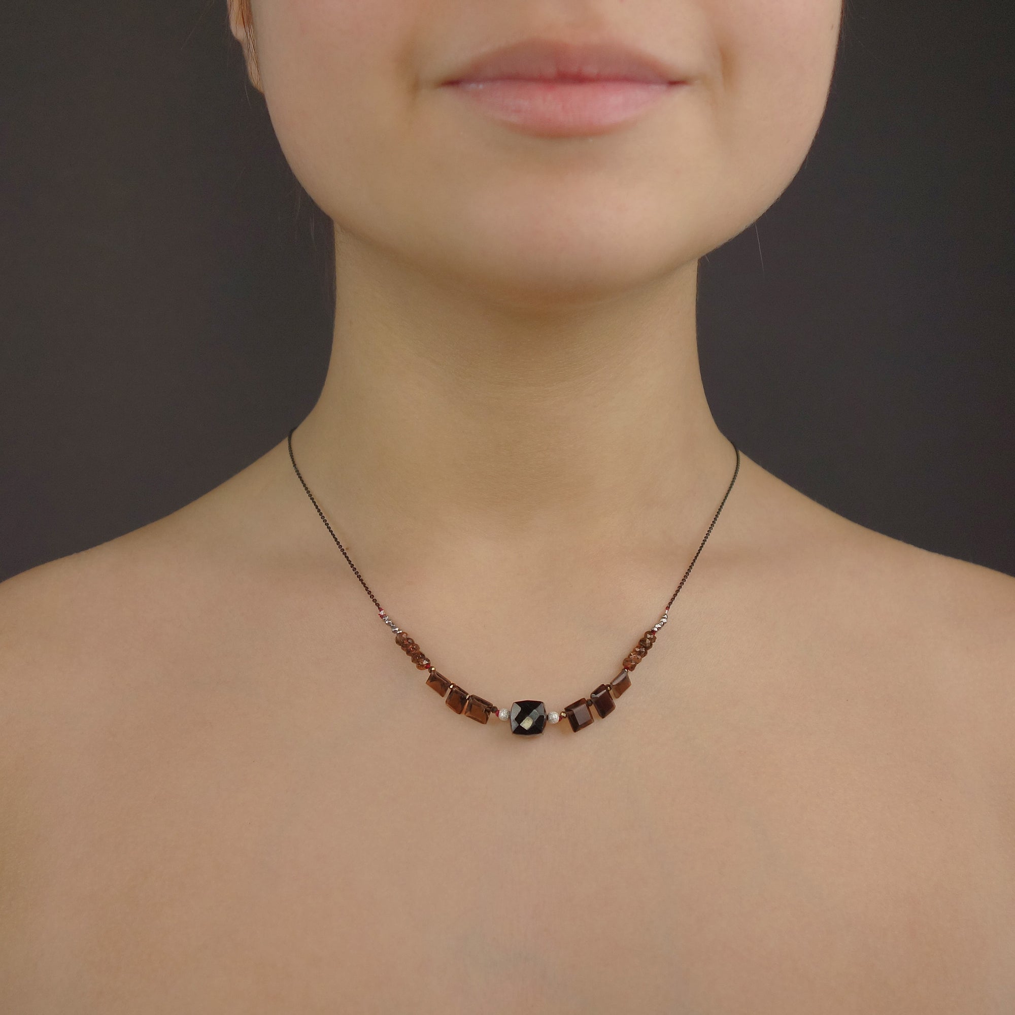Her Voice is Heard: topaz and onyx necklace