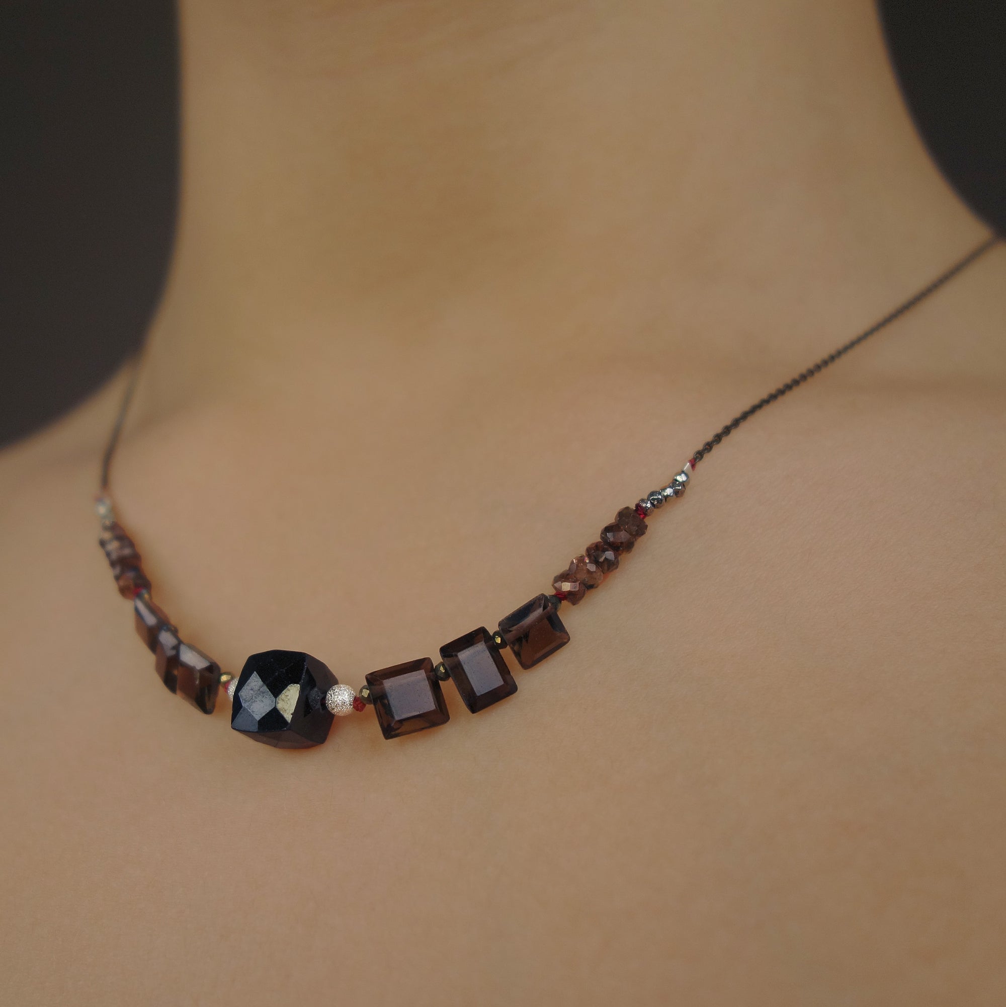Her Voice is Heard: topaz and onyx necklace