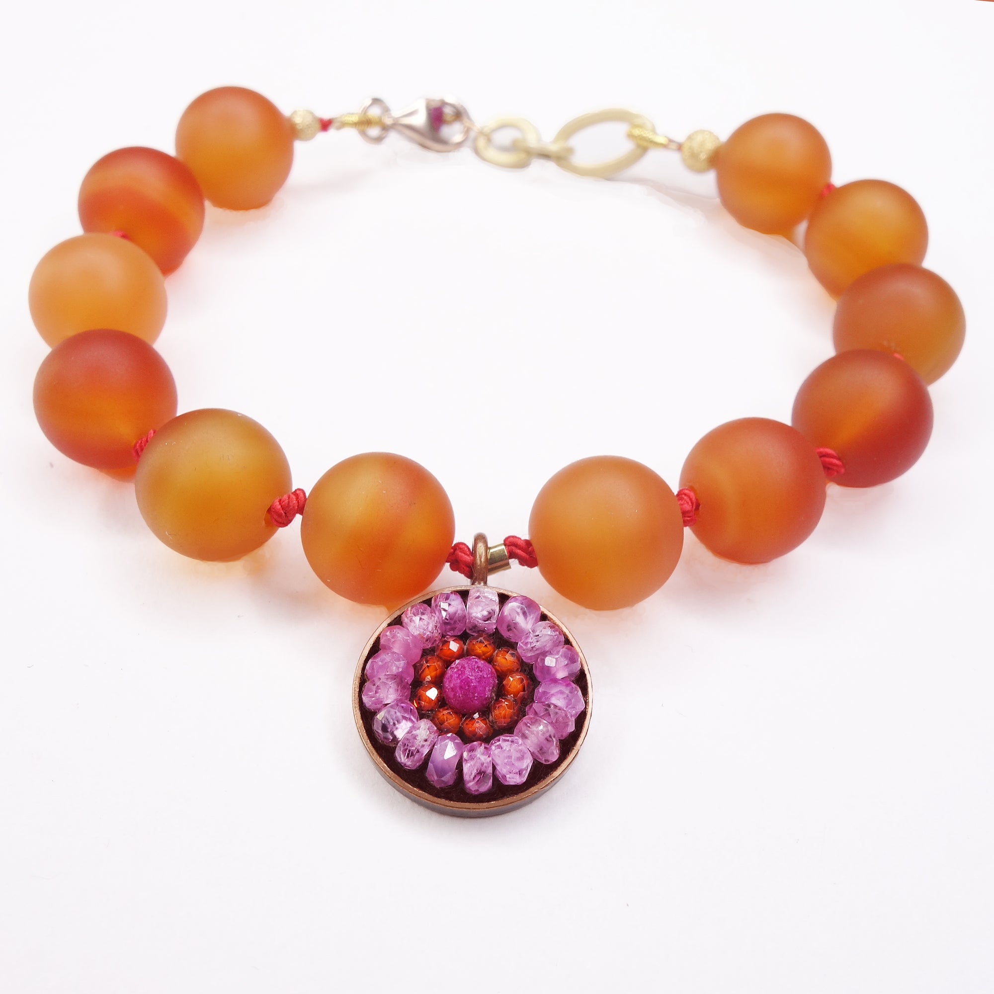 She Glows from Within: carnelian + ruby bracelet
