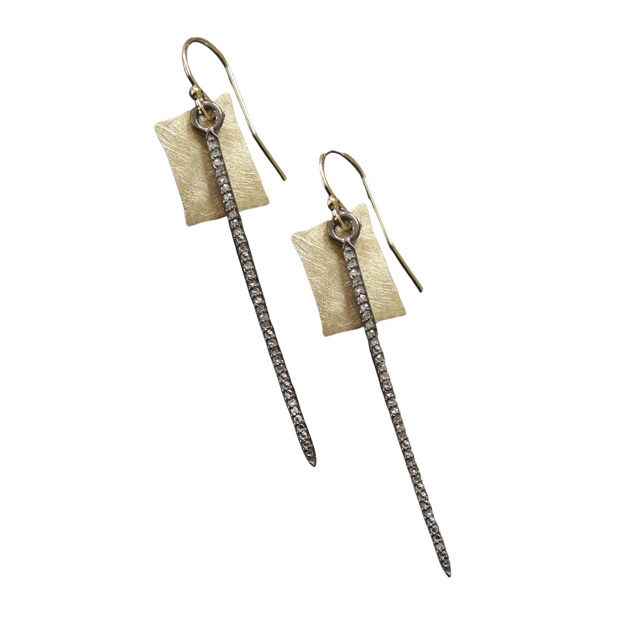 She is FIERCE: hand hammered gold and diamonds