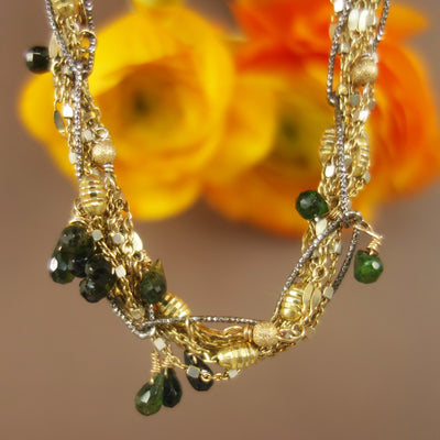 I've Seen Fire and Rain: emerald, gold, and silver bracelet
