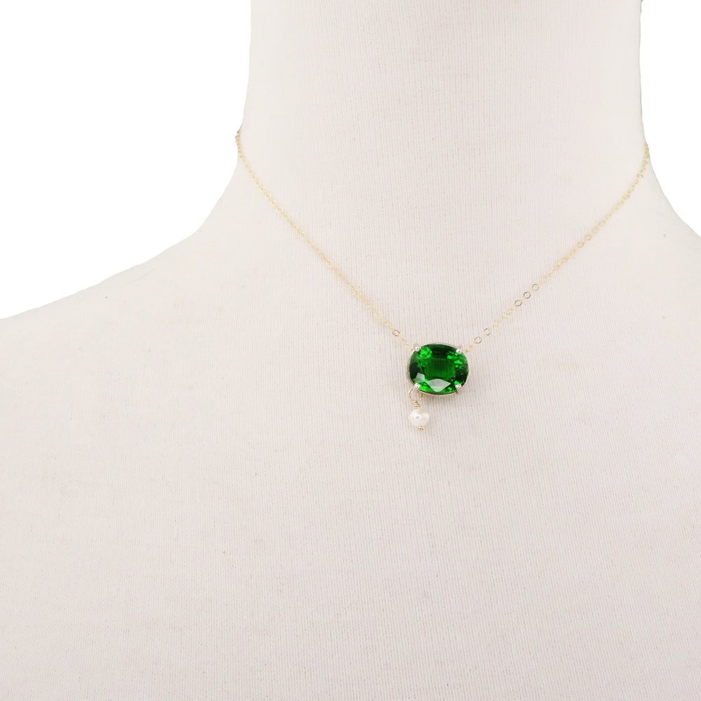 She Dazzled Them at the Moulin Rouge: tsavorite and pearl necklace