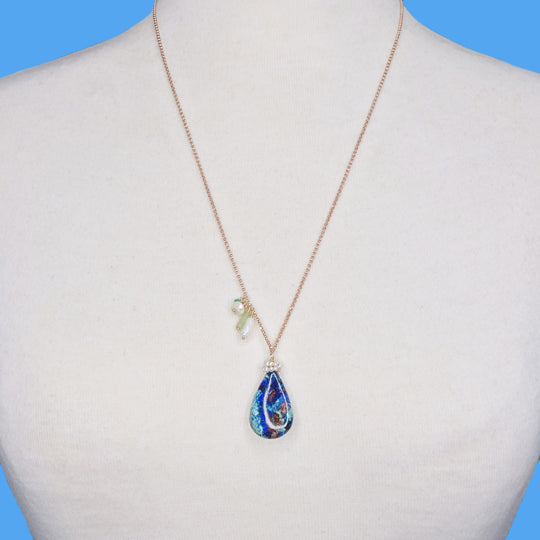 She Realized They Were Oceans Apart: lapis, opal, pearl necklace