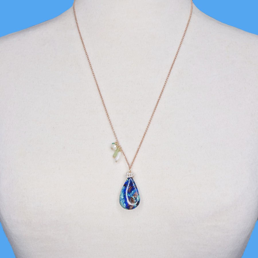 She Realized They Were Oceans Apart: lapis, opal, pearl necklace