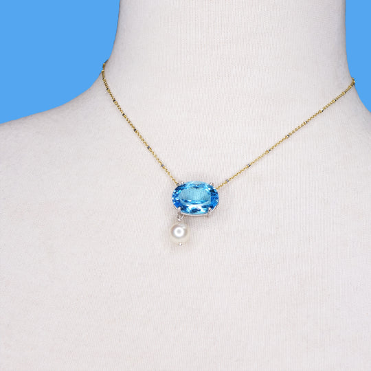 She Moves in Hues of Blues: Swiss topaz, pearl, and gold